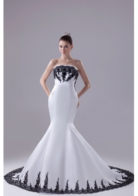 Strapless Mermaid Court Train Bridal Gowns Decorated with Black Lace Flowers