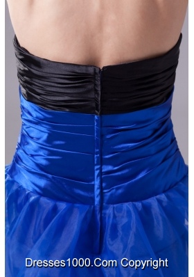 Blue Handle Flowers and Ruffled Layers Prom Dress with Black Breast