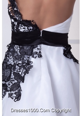 White Cool Back One Shoulder Prom Gowns with Black Lace Flowers and Sash