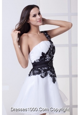 White Cool Back One Shoulder Prom Gowns with Black Lace Flowers and Sash