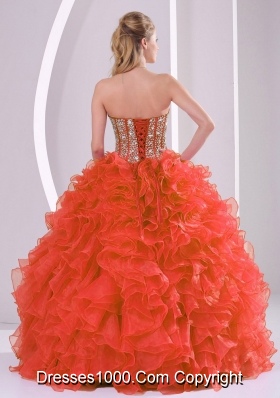 Ball Gown Sweetheart Ruffles and Beaded Decorate Coral Red Quinceanera Gowns