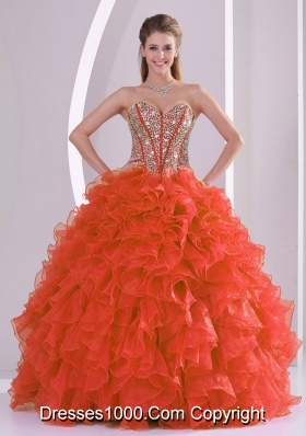 Ball Gown Sweetheart Ruffles and Beaded Decorate Coral Red Quinceanera Gowns