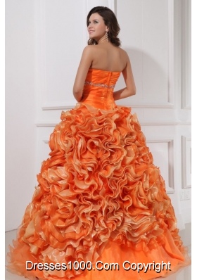 Orange Sweetheart Quinceanera Gown with Beading and Rolling Flowers