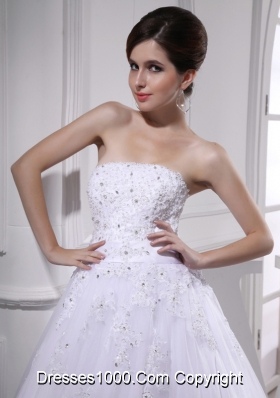 Exquisite A-line Beading and Appliques Chapel Train Wedding Dress with Strapless