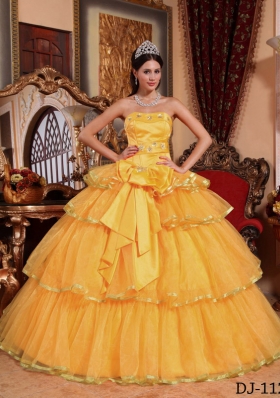 2014 Fashionable Golden Puffy Strapless Bow Quinceanera Dress with Ruffled Layers
