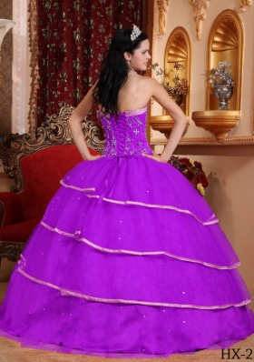 Purple Ball Gown Sweetheart Quinceanera Dress with Beading and Ruffled Layers