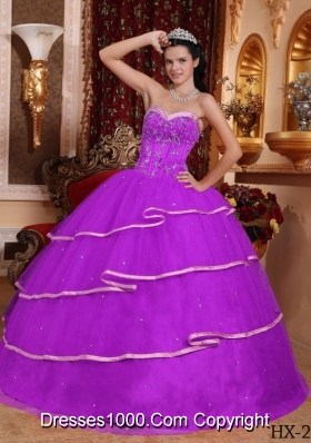 Purple Ball Gown Sweetheart Quinceanera Dress with Beading and Ruffled Layers