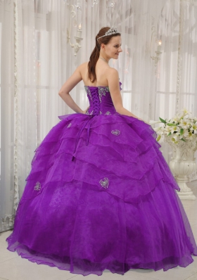 Purple Ball Gown Strapless Quinceanera Dress with Ruffled Layers