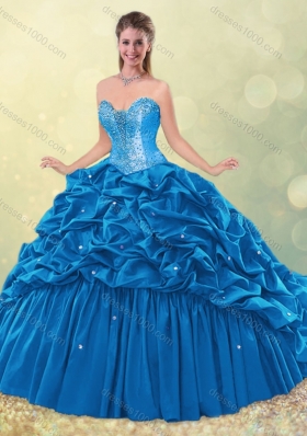 2016 Elegant Puffy Skirt Beaded Teal Quinceanera Dress with Brush Train