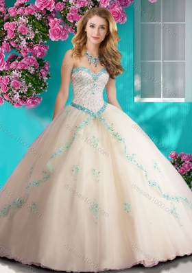 Elegant Beaded and Applique Tulle Quinceanera Dress in Champagne