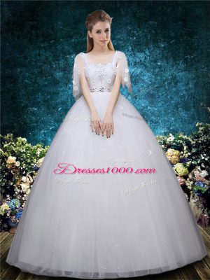 Unique Floor Length White Wedding Dresses Tulle Short Sleeves Beading and Appliques