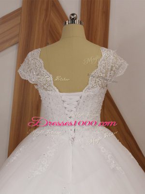 White Wedding Dresses Tulle Chapel Train Short Sleeves Beading and Lace and Appliques