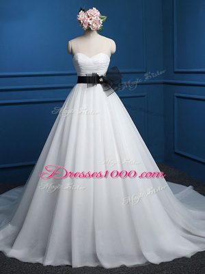 Trendy Sleeveless Tulle Court Train Lace Up Wedding Dress in White with Ruching and Bowknot