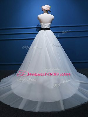 Trendy Sleeveless Tulle Court Train Lace Up Wedding Dress in White with Ruching and Bowknot
