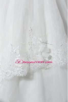 Captivating Sleeveless Tulle Brush Train Lace Up Bridal Gown in White with Lace and Appliques and Hand Made Flower