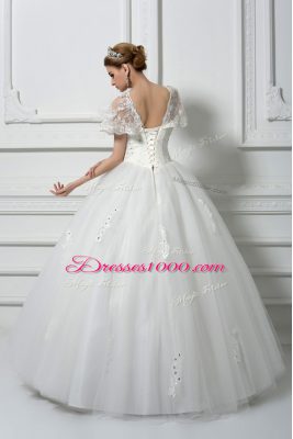 High Class Floor Length White Wedding Dress V-neck Short Sleeves Lace Up