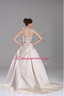 Elegant Champagne Ball Gowns One Shoulder Sleeveless Satin Brush Train Lace Up Embroidery and Hand Made Flower Quinceanera Dresses