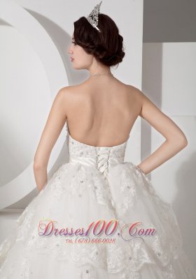 Sweetheart Tulle A-line Bridal Gown Court Train Sash and Beading