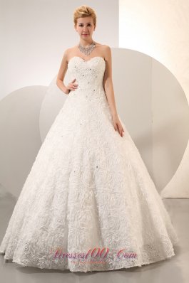 Ball Gown Beaded Wedding Dress With Rolling Flower