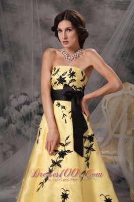 Yellow Prom Gowns with Black Applique and Sash