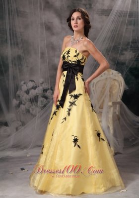 Yellow Prom Gowns with Black Applique and Sash