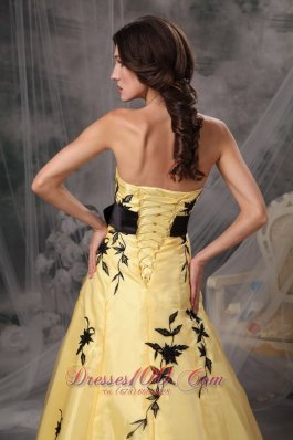 Yellow Prom Gowns with Black Applique and Sash