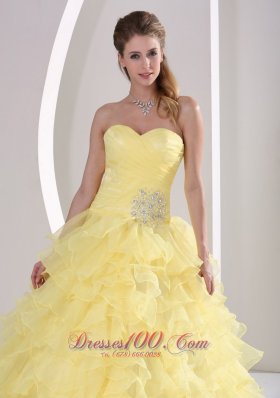 Light Yellow Ruffles Quinceaners Gowns Appliques and Ruch Organza