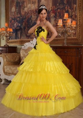 Yellow Layered Dresses for a Quince Appliques