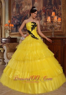 Yellow Layered Dresses for a Quince Appliques