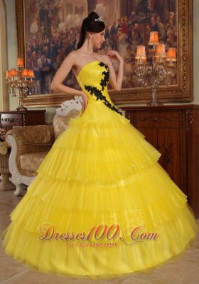 Yellow Layered Dresses for a Quince Appliques