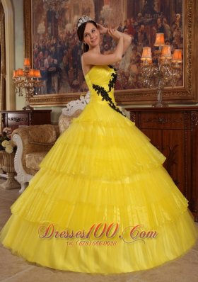 Yellow Layered Dresses for a Quince Appliques