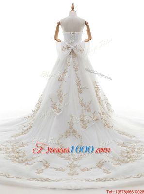 Glittering Sleeveless Tulle With Train Chapel Train Lace Up Wedding Gowns in White for with Appliques and Bowknot