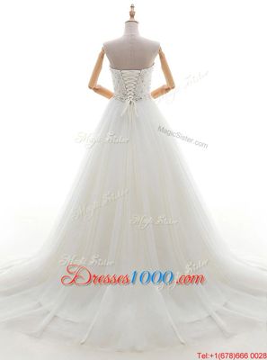 Sophisticated White Sleeveless Tulle Brush Train Lace Up Wedding Gowns for Wedding Party