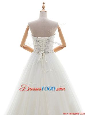 Sophisticated White Sleeveless Tulle Brush Train Lace Up Wedding Gowns for Wedding Party