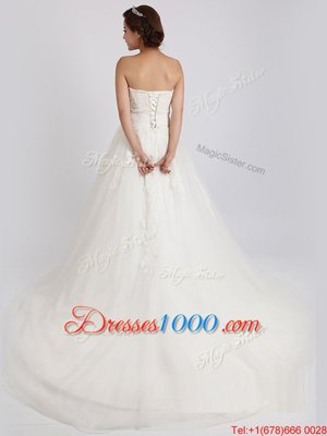 Charming Tulle Sleeveless With Train Wedding Dresses Court Train and Beading and Appliques