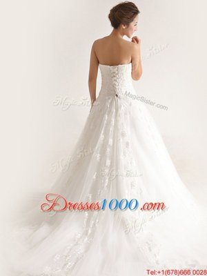 Luxurious Sleeveless Tulle With Train Court Train Lace Up Bridal Gown in White for with Appliques
