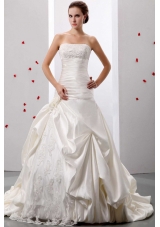 Applqiues and Ruch Wedding Gowns With Lace and Taffeta