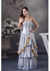 Beaded and Ruched Grey Prom Celebrity Dress with Ruffled Layers