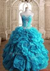 Latest Beaded and Ruffled Teal Quinceanera Gown in Organza