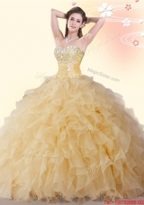 Lovely Gold Organza Quinceanera Gown with Beading and Ruffles