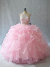 Modest Baby Pink Backless Halter Top Beading and Ruffles Quinceanera Gown Organza Sleeveless Brush Train