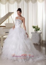A-line Strapless Beaded Bridal Gown Tulle Ruffles Sweep Train